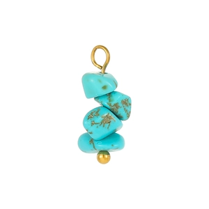 Detail of bohemian turquoise beads pendant with natural veins and golden metal ring