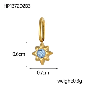 Macro shot of gold star-shaped pendant with blue rhinestone and 0.6x0.7cm measurements