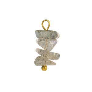 Close-up of bohemian blue crushed stone charm with gold titanium steel wire wrapping