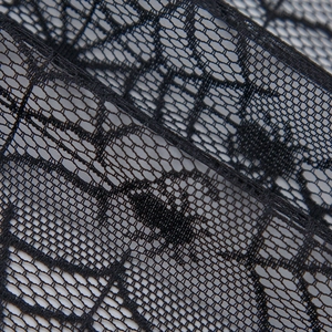 Halloween black lace door curtain featuring intricate spider and cobweb patterns