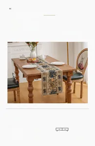 Close-up of bohemian table runner with blue elephant patterns on linen fabric