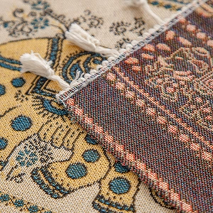 American style table runner with elephant stripe pattern and white tassel fringe
