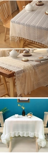 Detail showing lace crochet pattern with tassels and ruffle edges on table cloth