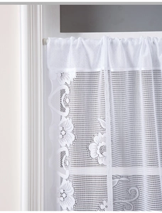 Detailed close-up of white floral lace cafe curtain with intricate mesh texture and embroidery
