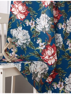 Close-up of luxury oil painting peony curtain fabric with elegant dark blue floral print