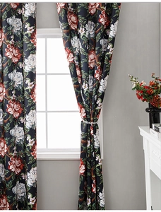 Detailed texture of luxury navy floral blackout curtain with elegant pearl tieback accessory