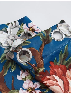 Detail of luxury oil painting peony curtain with silver grommets and thick blue fabric