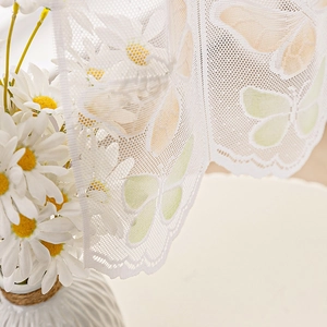 White lace cafe curtain featuring elegant daisy and butterfly patterns for kitchen decor