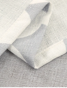 Detailed macro shot of the grey printed polyester tablecloth showing premium hem stitching