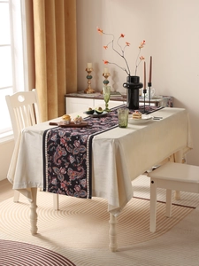 Close-up of American minimalist floral table runner with waterproof dark pattern fabric