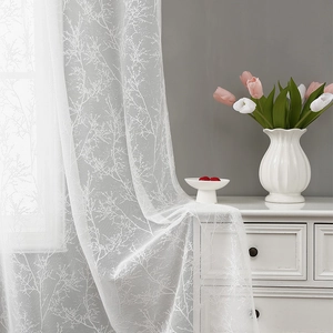 White lace curtain with branch patterns for living room in elegant home setting