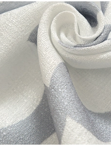 Macro view of high-grade textured fabric curtains with elegant gourd floral patterns