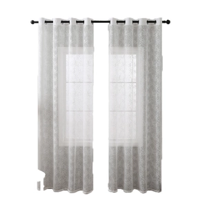 Minimalist white lace curtains with tree branch pattern and metal grommets on black rod