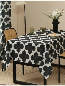 Detail of black Moroccan trellis pattern tablecloth with high-quality thick fabric texture