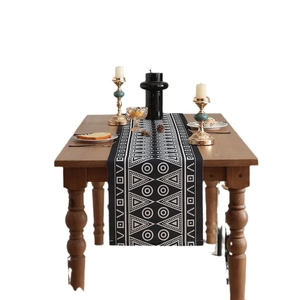 Modern black geometric table runner with waterproof fabric and bohemian patterns