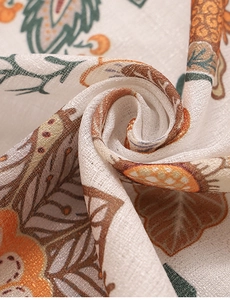 Macro shot of modern botanical floral print on high-end linen-textured curtain fabric