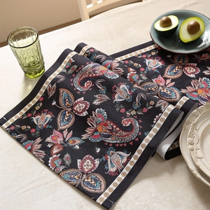 Modern black table runner with floral paisley pattern and bohemian waterproof fabric