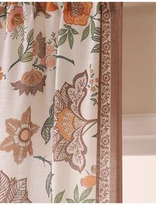Detailed close-up of retro floral prints and linen-textured fabric on semi-blackout curtains