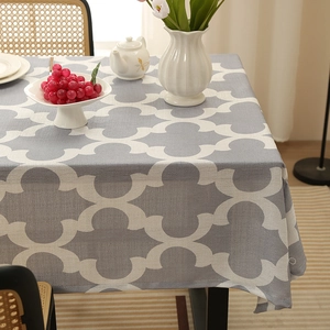 Grey and white geometric interlocking pattern tablecloth with woven texture for dining table