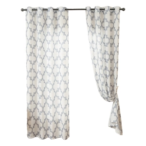 White linen curtains with grey-blue geometric pattern and metal eyelets for living room