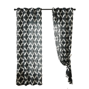 Grey and white Moroccan quatrefoil curtains with textured linen finish and metal grommets