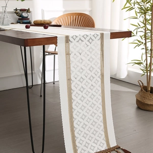 Modern Nordic woven table runner with beige lace patterns and elegant beaded tassels