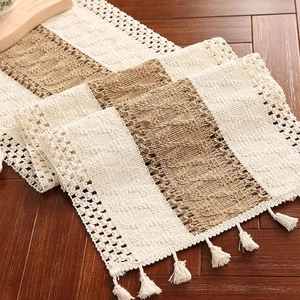Bohemian woven table runner with tassels and hollow crochet patterns in cream and beige