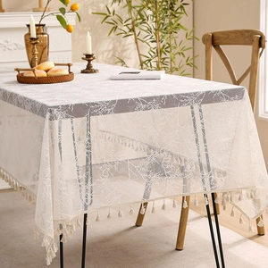 Elegant beige lace tablecloth with branch patterns and tassels for dining tables