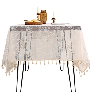 Elegant beige lace tablecloth with tree branch embroidery and vintage cotton tassels