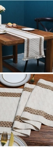 Detail of woven linen table runner with hollow geometric patterns and handmade tassels