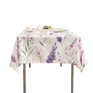 Lavender floral rectangular tablecloth on a dining table with a fresh country style decor