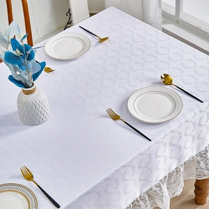 Nordic white linen tablecloth with grey branch patterns and wide lace border for dining tables