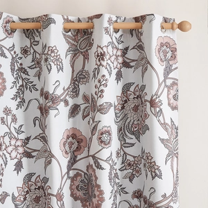 Close-up of vintage floral blackout curtain with metal eyelets and premium fabric texture