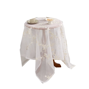 White lace tablecloth with yellow floral embroidery for round tea tables and decor