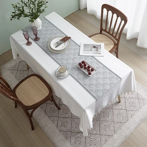 French cotton linen tablecloth with gray embossed pattern and decorative tassels