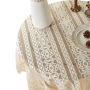Elegant beige round lace tablecloth with floral hollow patterns for dining tables