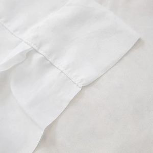 Premium velvet sheer curtain detail showing high-density white fabric and seamless stitching