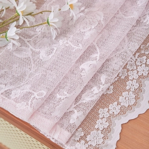 French lace sheer curtain with delicate floral crochet pattern and scalloped edges