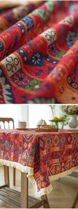 Macro detail of Bohemian woven tablecloth fabric with intricate patterns and white tassels