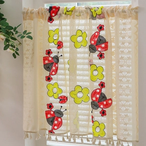 Beige lace cafe curtain with embroidered ladybugs and sunflowers featuring tassel trim