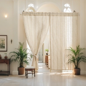 Modern beige linen blend curtain panels with vertical stripes and tassel trim decor
