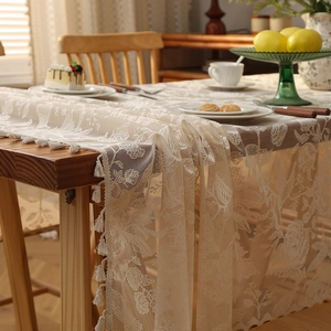 Bohemian beige lace tablecloth with floral hollow patterns and tassel fringe detail
