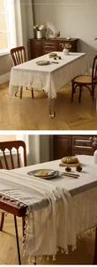 Detail of striped linen tablecloth with decorative fringes and soft drape texture