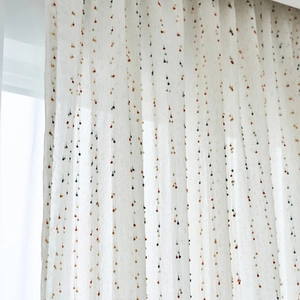 Retro linen-style cafe curtain in off-white with colorful mini tassel decorations