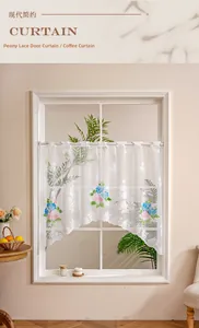 Close-up of white lace cafe curtain with pink and blue peony embroidery for kitchen windows