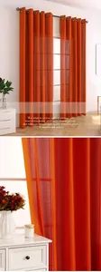 Detailed macro view of orange semi-transparent vertical stripe curtain fabric with eyelets