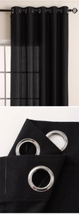 Close-up of black sheer curtain fabric with vertical stripes and silver metal grommet detail