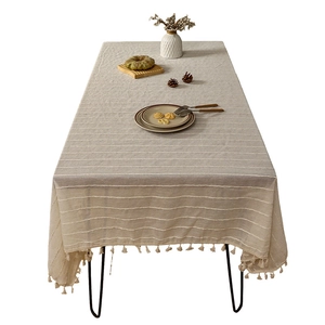 Japanese style beige linen tablecloth with striped texture and tassel fringe edge