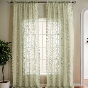 Rideau en dentelle vert matcha avec motifs de feuilles et bordures festonnées élégantes