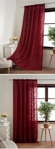 Detail of wine red lace curtain with floral patterns and rod pocket hanging design